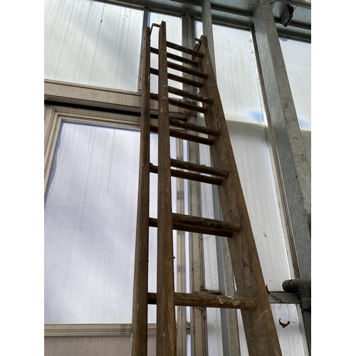 1588 - A TWO SECTION VINTAGE WOODEN EXTENDABLE 30 RUNG LADDER