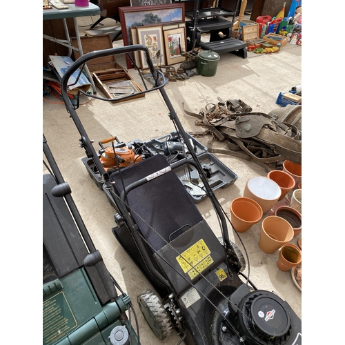 1605 - A PETROL LAWN MOWER WITH GRASS BOX AND BRIGGS AND STRATTON ENGINE