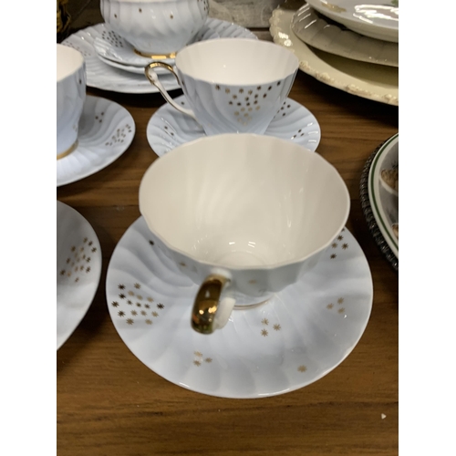 1234 - A TWELVE PIECE QUEEN ANNE TEASET - BABY BLUE WITH GOLD STARS