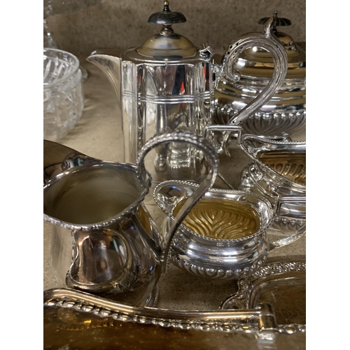 1257 - A QUANTITY OF SILVER PLATE TO INCLUDE A TEAPOT, COFFEEPOT, SUGAR BOWL, JUGS AND TRAY