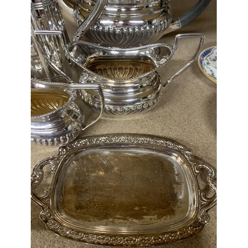 1257 - A QUANTITY OF SILVER PLATE TO INCLUDE A TEAPOT, COFFEEPOT, SUGAR BOWL, JUGS AND TRAY