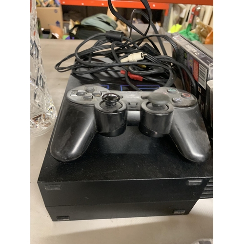 1268 - A PLAYSTATION 2 CONSOLE WITH CONTROLLER AND GAMES TO INCLUDE MEDAL OF HONOUR UNDERGROUND, 007 THE WO... 