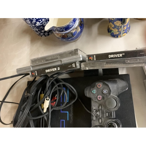 1268 - A PLAYSTATION 2 CONSOLE WITH CONTROLLER AND GAMES TO INCLUDE MEDAL OF HONOUR UNDERGROUND, 007 THE WO... 