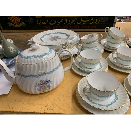 1300 - A LARGE QUANTITY OF MINTON ARDMORE CERAMICS TO INCLUDE CUPS, PLATES AND A TEAPOT