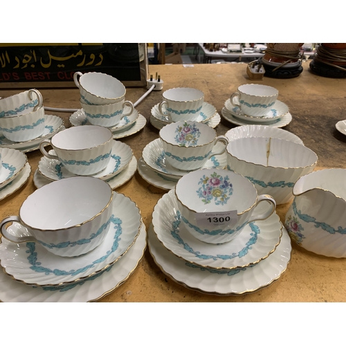 1300 - A LARGE QUANTITY OF MINTON ARDMORE CERAMICS TO INCLUDE CUPS, PLATES AND A TEAPOT