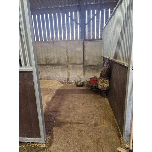 283 - FIVE AEI STABLES OF 5 MIDDLES 14' X 10'  AND  ONE SOLID END  WITH SLIDING DOORS AND ANTI WEAVE BARS ... 