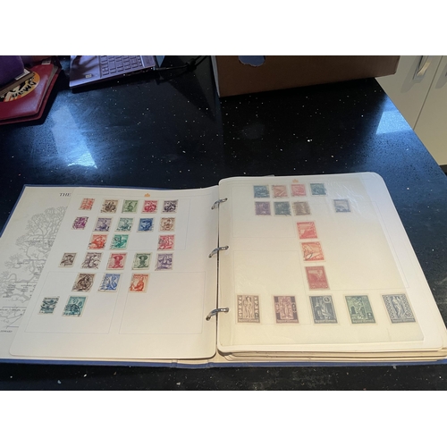 340A - THE ROYAL FAMILY STAMP ALBUM OF WORLD STAMPS - HUNGARY, CUBA, POLAND ETC