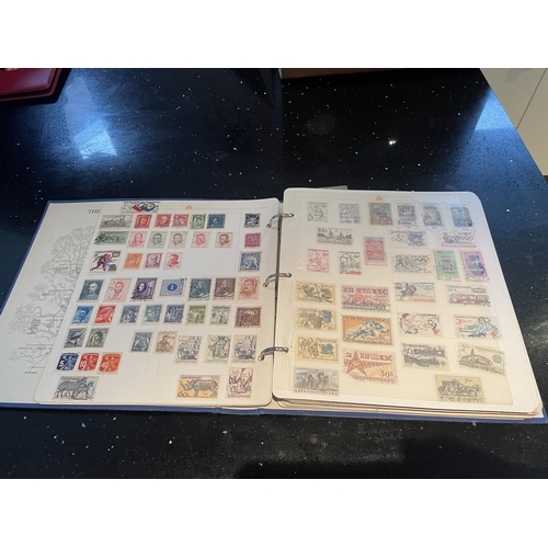 340A - THE ROYAL FAMILY STAMP ALBUM OF WORLD STAMPS - HUNGARY, CUBA, POLAND ETC