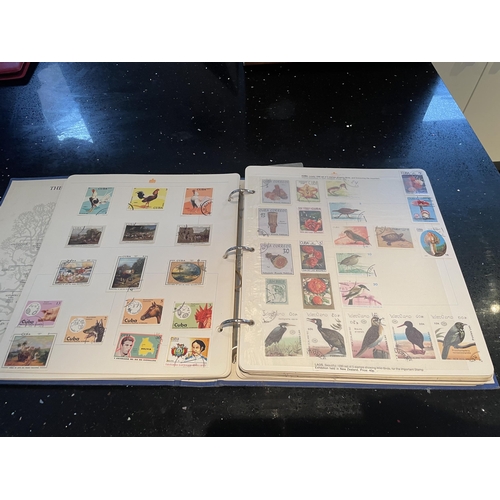 340A - THE ROYAL FAMILY STAMP ALBUM OF WORLD STAMPS - HUNGARY, CUBA, POLAND ETC