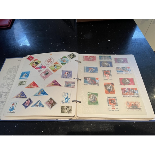 340A - THE ROYAL FAMILY STAMP ALBUM OF WORLD STAMPS - HUNGARY, CUBA, POLAND ETC