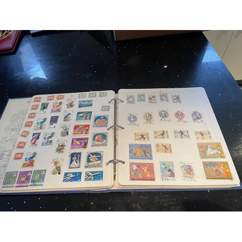 340A - THE ROYAL FAMILY STAMP ALBUM OF WORLD STAMPS - HUNGARY, CUBA, POLAND ETC