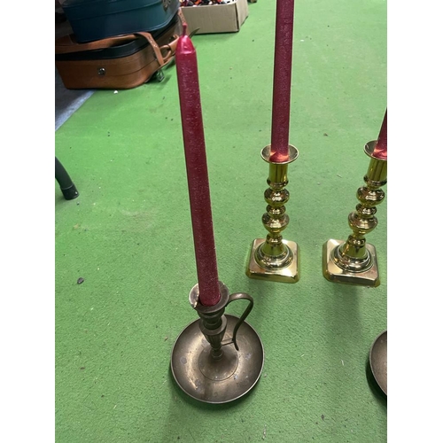 1017A - TWO PAIRS OF VINTAGE BRASS CANDLESTICKS WITH CANDLES