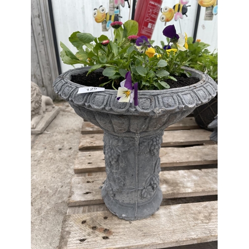 A CONCRETE PEDESTAL PLANTER WITH GRAPE DESIGN NO VAT