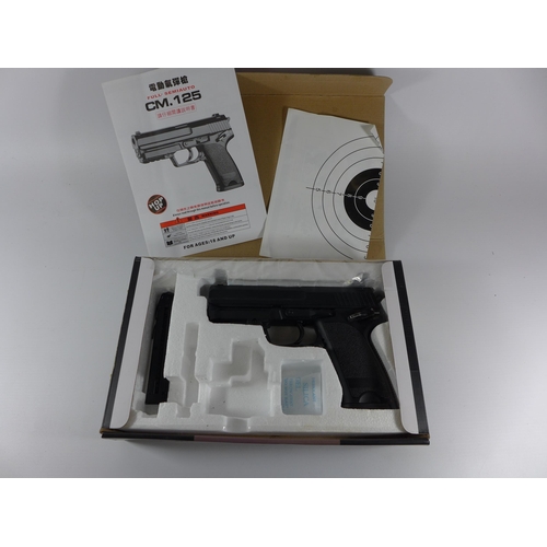 387 - A BOXED CM 125 AIRSOFT 6MM CALIBRE ELECTRIC PISTOL, LENGTH 20CM