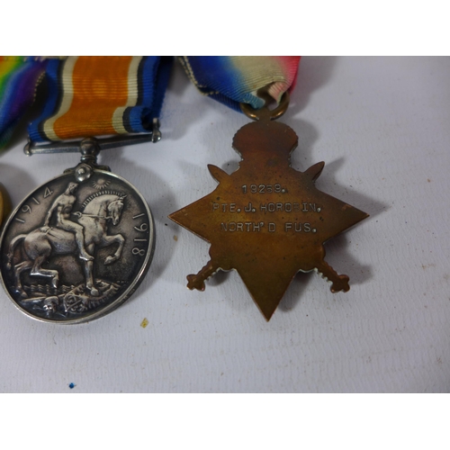 406 - A WORLD WAR I MEDAL GROUP AWARDED TO 19269 PRIVATE J HOROBIN OF THE NORTH FUSILIERS, COMPRISING 1914... 