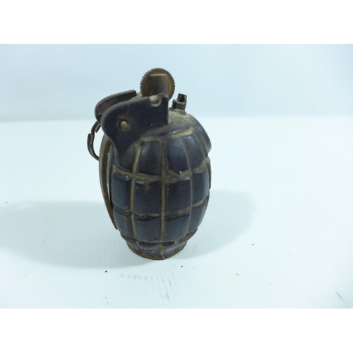 324 - A WORLD WAR II PERIOD GRENADE MADE INTO A LIGHTER, HEIGHT 10CM