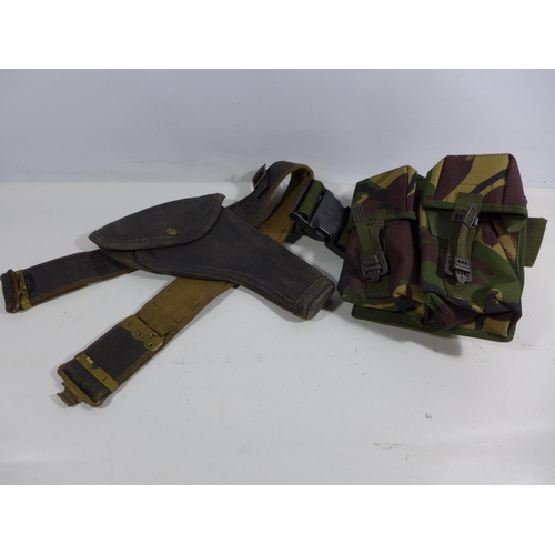 353 - A MILITARY ISSUE CANVAS BELT AND HOLSTER AND A CAMOUFLAGE BELT PACK (2)