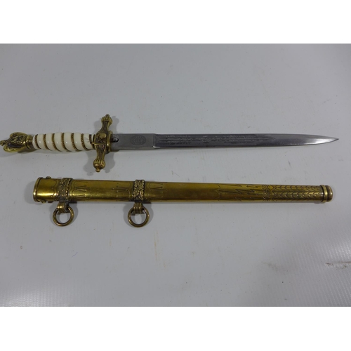 355 - AN EAGLE & SWASTIKA MARKED KRIEGSMARINE NAVAL, DAGGER AND SCABBARD OF UNKNOWN AGE, 25CM BLADE WITH A... 