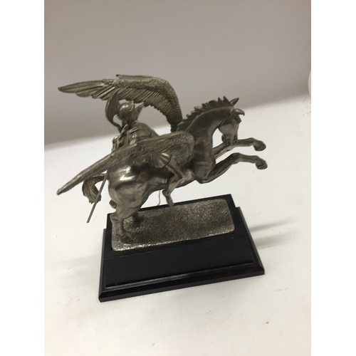 359 - A WHITE METAL MODEL OF PEGASUS BEING RIDDEN BY PERSEUS, MOUNTED ON A BLACK WOODEN BASE,HEIGHT 22CM, ... 