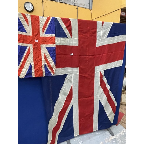 440 - A LARGE HESSIAN UNION JACK, 150 X 267CM AND A SMALLER EXAMPLE