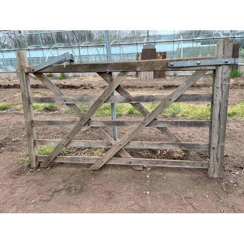 332 - A PAIR OF WOODEN GATES 7' WIDE EACH  NO VAT