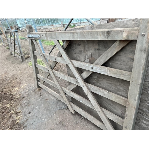 332 - A PAIR OF WOODEN GATES 7' WIDE EACH  NO VAT