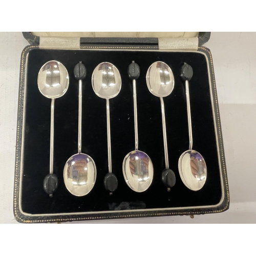 11 - A CASED SET OF SIX HALLMARKED SILVER COFFEE BEAN SPOONS