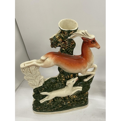 16 - A PAIR OF STAFFORDSHIRE FLATBACK DEER SPILL HOLDERS