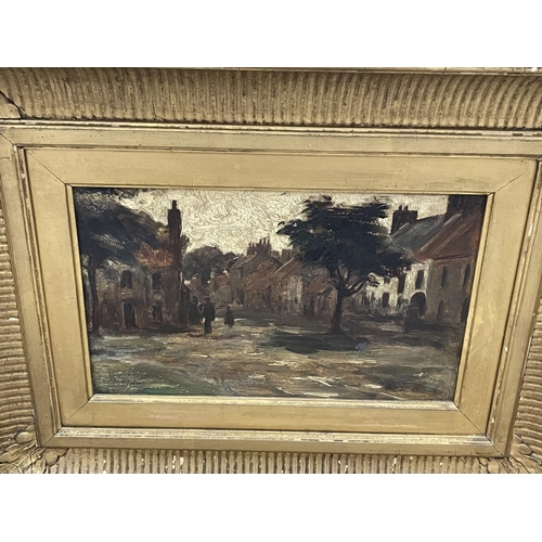 17 - AN ANTIQUE GILT FRAMED OIL PAINTING OF A VILLAGE SCENE, UNSIGNED