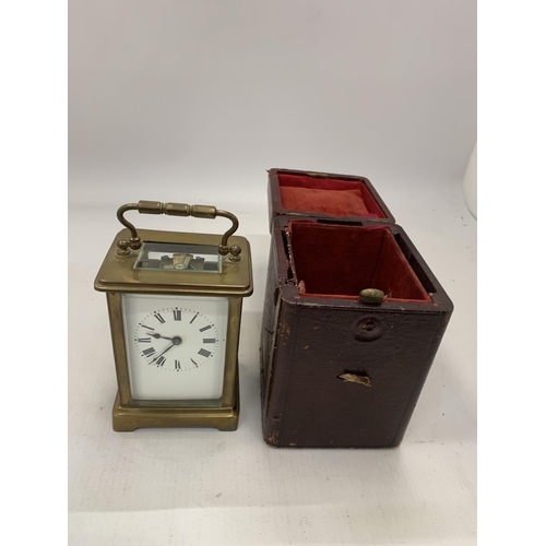 178 - A FRENCH BRASS CASED CARRIAGE CLOCK IN ORIGINAL OUTER CASE WITH KEY