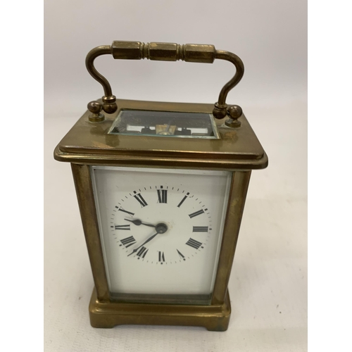 178 - A FRENCH BRASS CASED CARRIAGE CLOCK IN ORIGINAL OUTER CASE WITH KEY