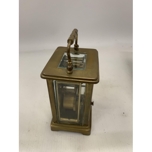 178 - A FRENCH BRASS CASED CARRIAGE CLOCK IN ORIGINAL OUTER CASE WITH KEY