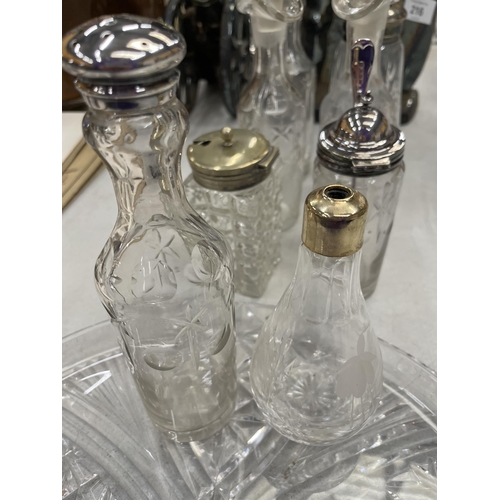 217 - A MIXED LOT OF GLASSWARE TO INCLUDE CUT GLASS TRAY, CONDIMENT BOTTLES ETC