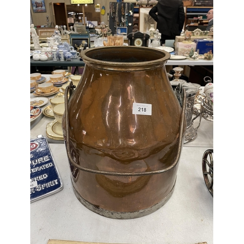 218 - A VINTAGE COPPER MILK CHURN WITH HANDLE