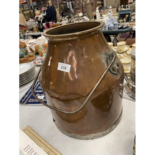 218 - A VINTAGE COPPER MILK CHURN WITH HANDLE