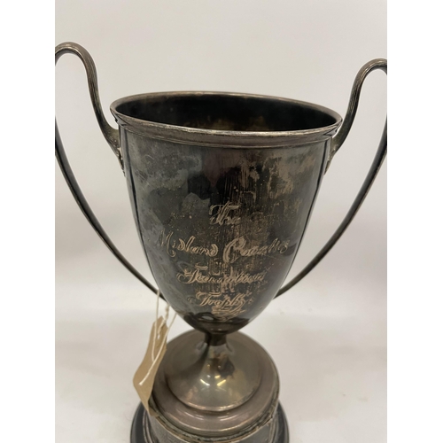 23 - A HALLMARKED SILVER TWIN HANDLED TROPHY CUP, HEIGHT 28CM, (HALLMARKS RUBBED) GROSS WEIGHT WITHOUT BA... 