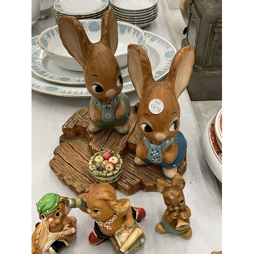 246 - A COLLECTION OF PENDELFIN RABBITS TO INCLUDE MOTHER RABBIT, STAND ETC