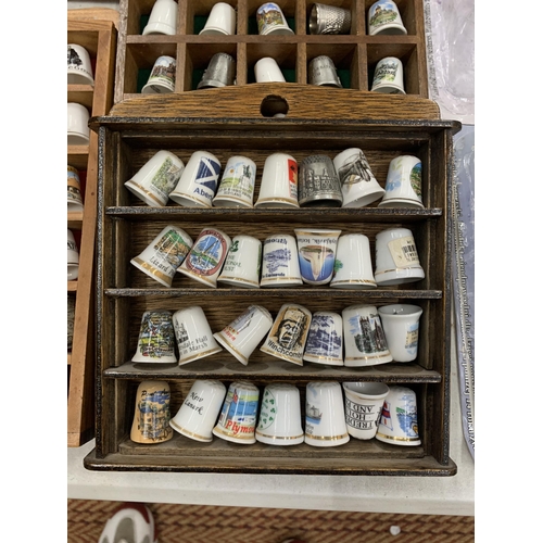 254 - SIX WOODEN DISPLAYS OF CERAMIC THIMBLES