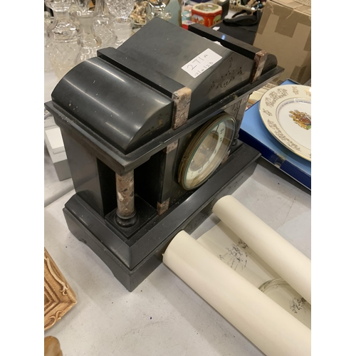 271A - A VINTAGE BLACK MARBLE MANTLE CLOCK WITH PILLAR DECORATION VENDOR STATES IN WORKING ORDER BUT NO WAR... 