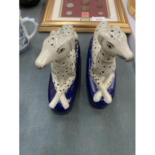 274 - A PAIR OF STAFFORDSHIRE DALMATIONS AND A FRAIMED 1982 COIN SET