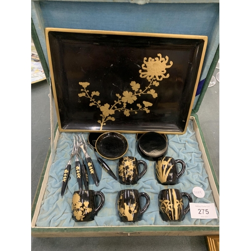 275 - A VINTAGE CASED ORIENTAL LACQUERED TEA SET AND FURTHER BOWLS