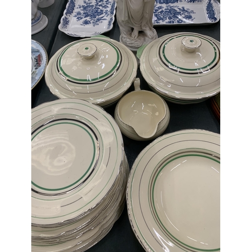 295 - AN ART DECO ALFRED MEAKIN PART DINNER SERVICE AND PARIAN STYLE FIGURE