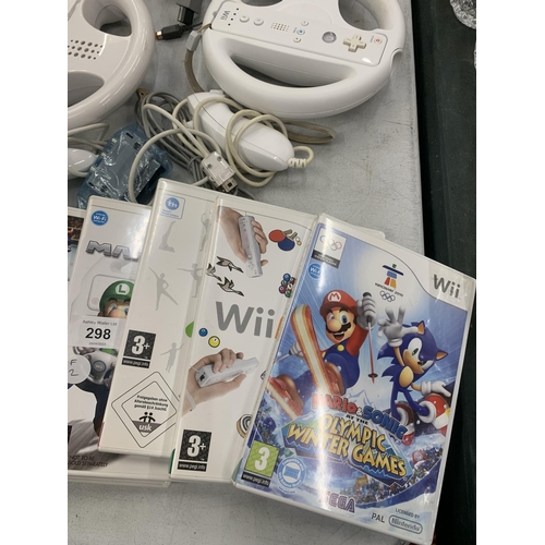 298 - A NINTENDO WII WITH GAMES, CONTROLLERS, WHEELS, MARIO GAMES ETC