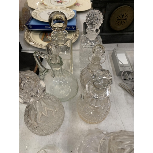 299 - A MIXED LOT OF VINTAGE CUT GLASS DECANTERS ETC