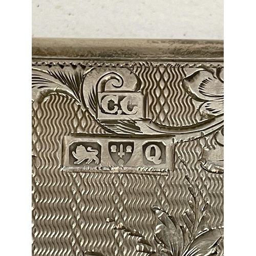 36 - A VICTORIAN SILVER WALLET WITH FLORAL CHASED & ENGRAVED DESIGN, IN ORIGINAL CASE, HALLMARKS FOR CHES... 