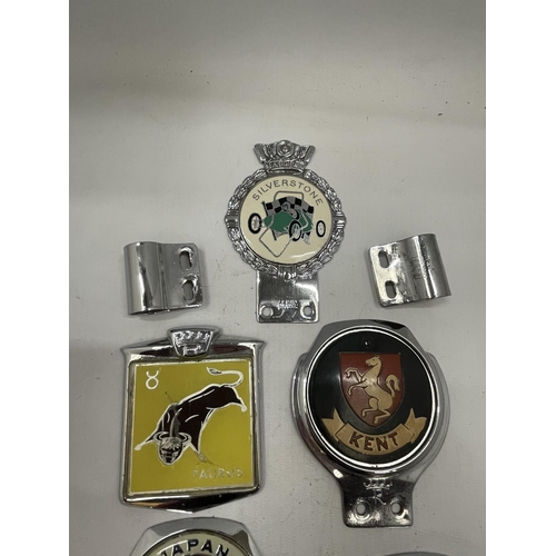 39 - A COLLECTION OF FIVE VINTAGE CAR BADGES, YORKSHIRE, SILVERSTONE ETC