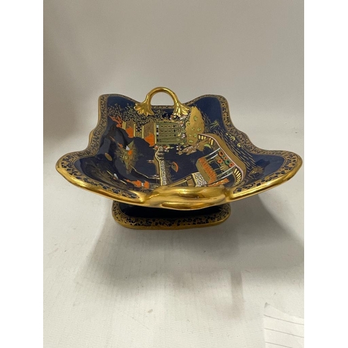 56 - A CARLTON WARE TWIN HANDLED PEDESTAL BOWL DECORATED IN THE 'MIKADO' PATTERN WITH GILT DESIGN ON A CO... 