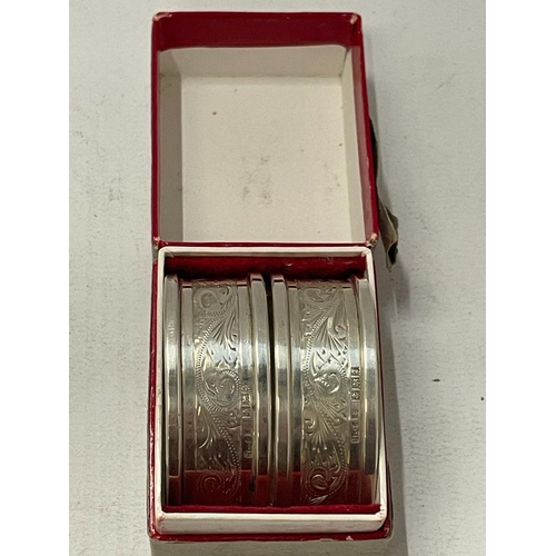 58 - A BOXED PAIR OF HALLMARKED SILVER NAPKIN RINGS, TOTAL WEIGHT 26G