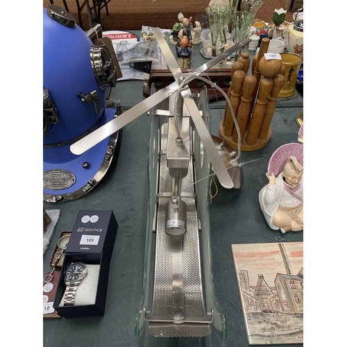 108 - A LARGE CHROME AND GLASS HELICOPTER CEILING LIGHT HEIGHT APPROX 30CM, LENGTH APPROX 63CM