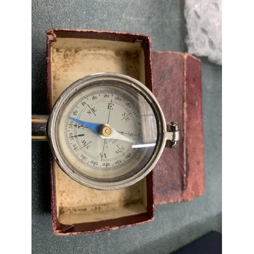 110 - A VIAINTAGE COMPASS AND MAGNIFYING GLASS - BOXED